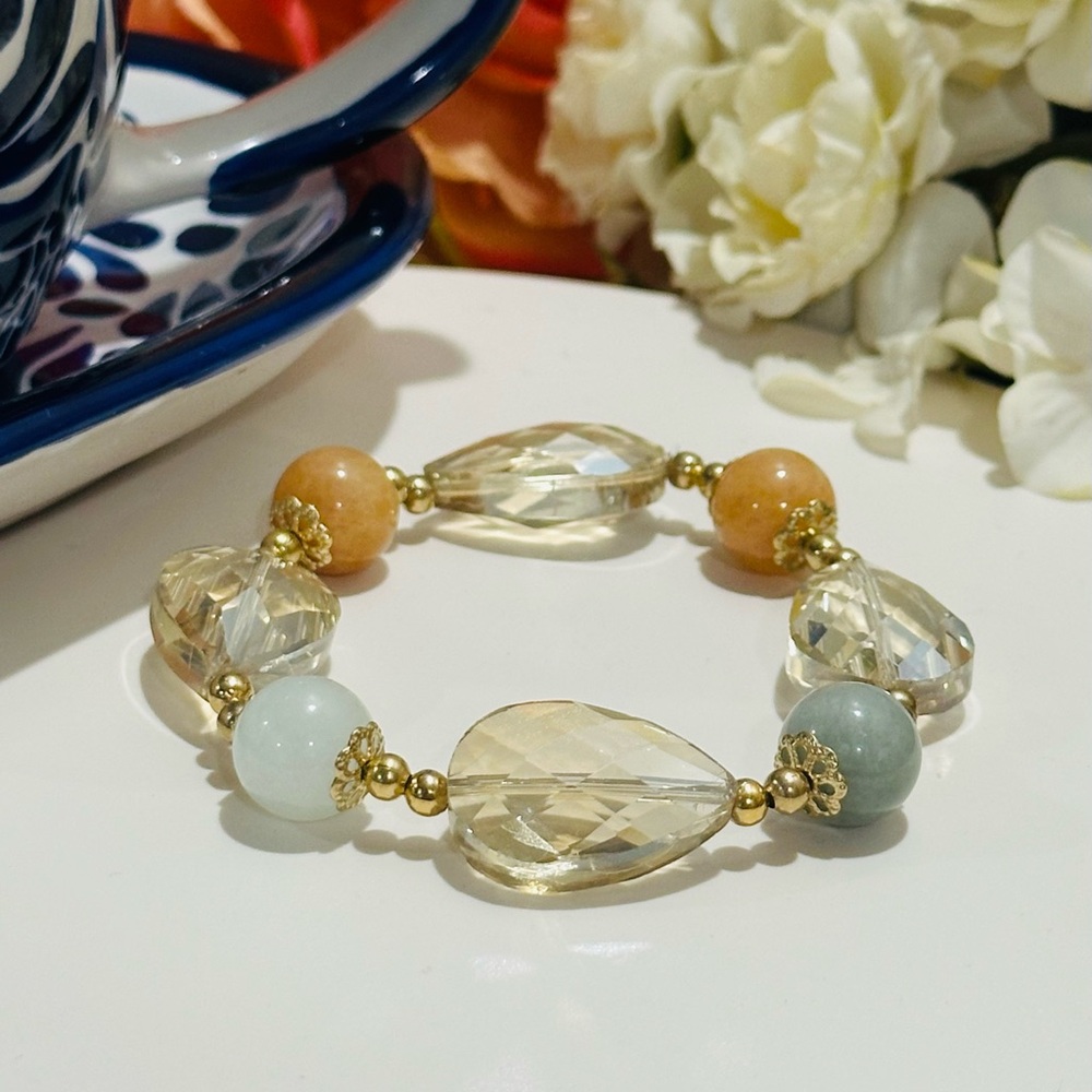 Elegant Gold and Cream Bracelet with Intricate Beadwork